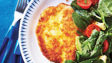 chicken cutlet breaded with salad
