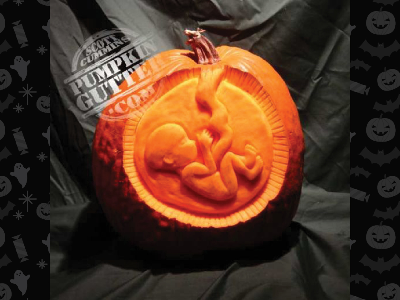 carving of fetus on pumpkin