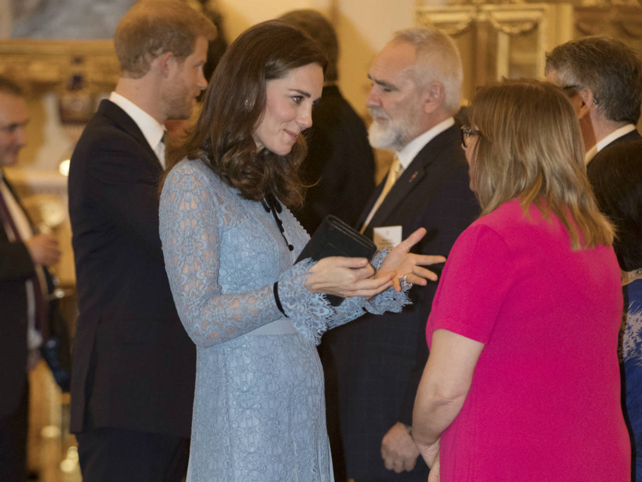 Kate Middleton showing off her baby bump