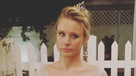 Kristen Bell looks annoyed wearing a crown.