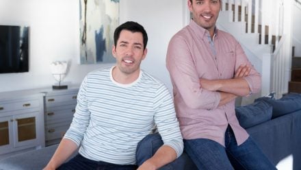 The Property Brothers- Drew and Jonathan Scott in a living room