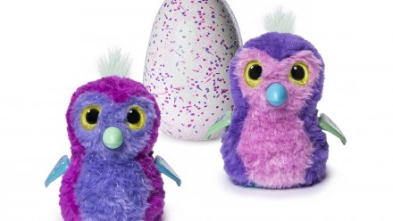 two purple penguala hatchimals and one unhatched egg