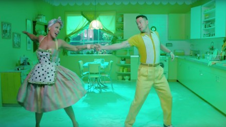 Pink and Channing Tatum dancing in a brightly coloured kitchen