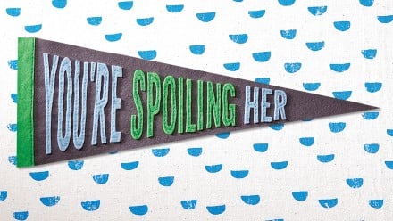A pennant with the words "You're spoiling her" on it