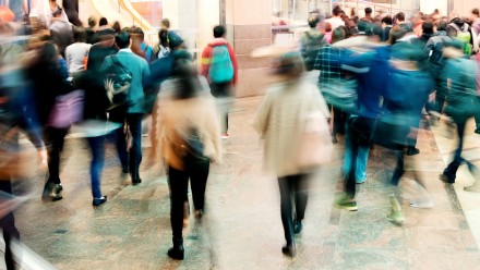 A crowd in a busy mall