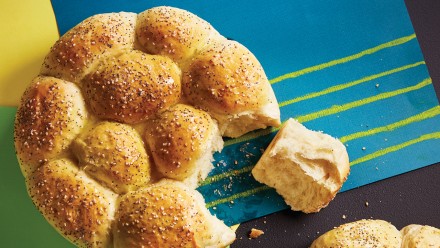 Round of pull-apart rolls topped with seeds