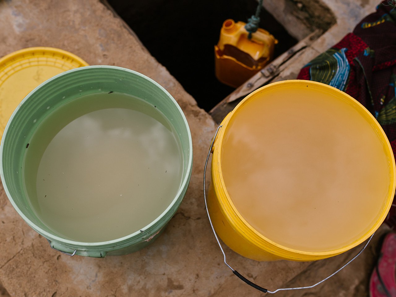 two pails of dirty water