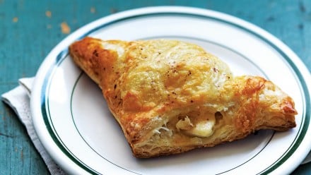 Crisp puffed pastry turnover stuffed with cheese and apple