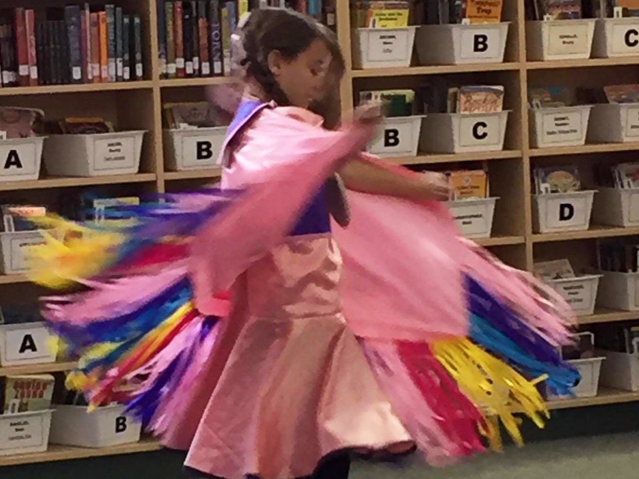 Staceys daughter spinning during a dance performance
