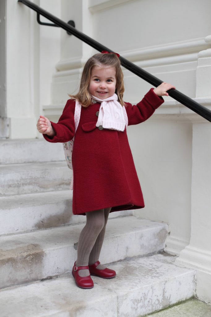 Princess Charlotte smiling on the steps of Kensington Palace