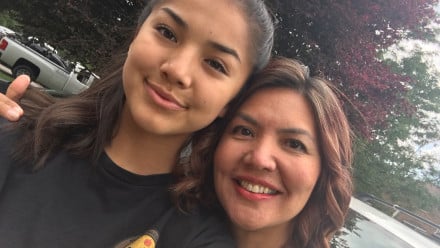 Photo of an indigenous mom and her teen daughter