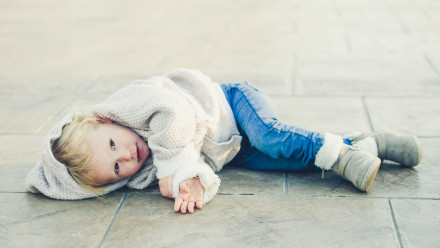 Photo of a toddler on the floor