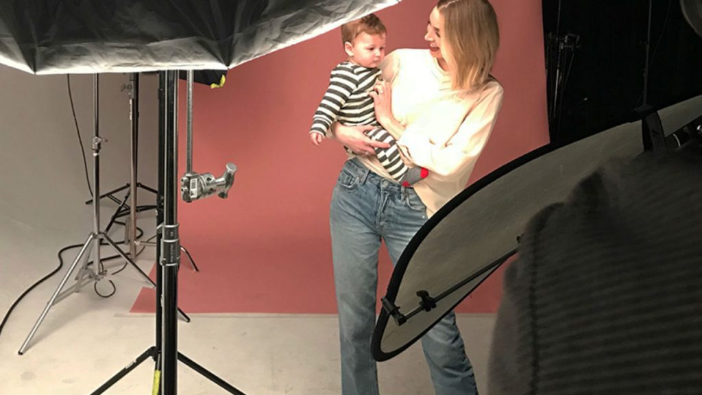 Mother and son on set at a photoshoot. 