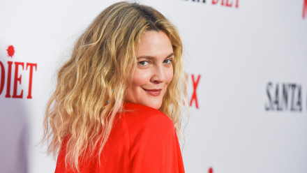 Drew Barrymore looking over her shoulder at the season 2 premiere of the Santa Clarita Diet