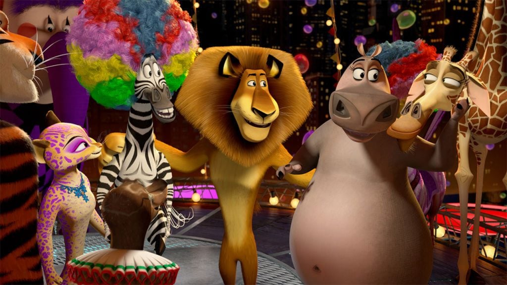 Promo image for Madagascar 3 Europe's Most Wanted showing zoo animals at a party