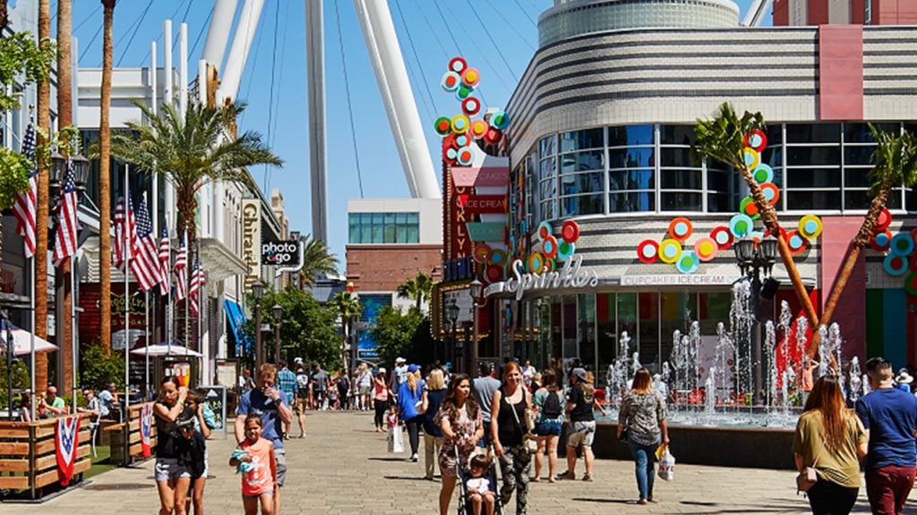 Photo of the LINQ promenade with people walking around