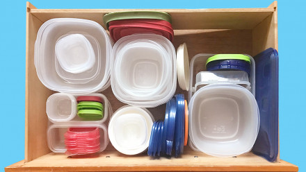 Tupperware organized in drawers.