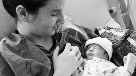 Black and white photo of a mom and her newborn baby