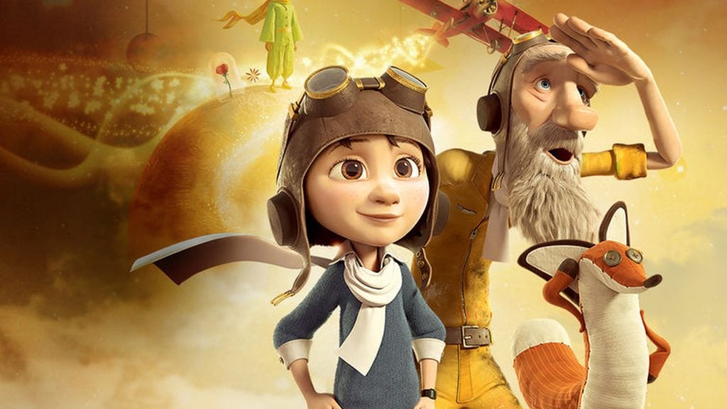 Still from The Little Prince with old man and boy looking up