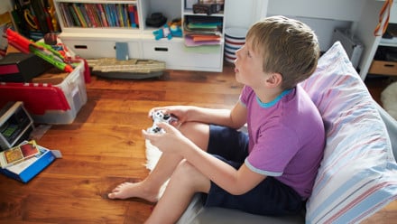 older Kid playing video games