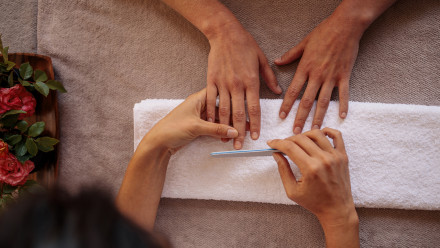 Photo of a woman getting a manicure