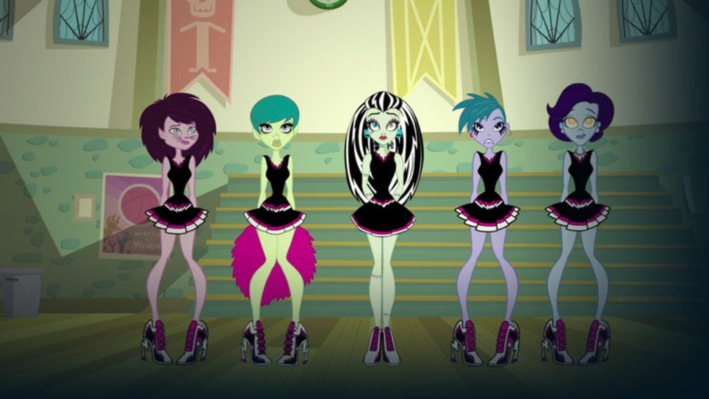 Promo image for monster high new ghoul at school showing animated monster girls trying out for cheerleading