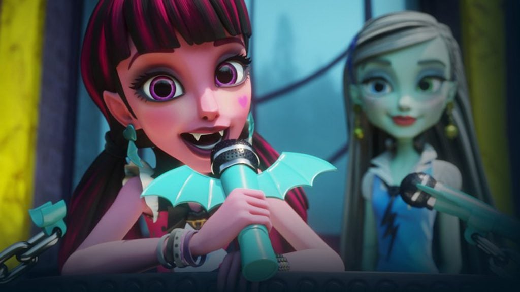 Promo image for Monster high the origin story showing an animated vampire girl talking into a microphone