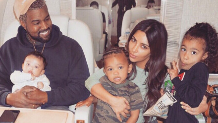 Kim and Kanye with their three kids North, Saint and Chicago
