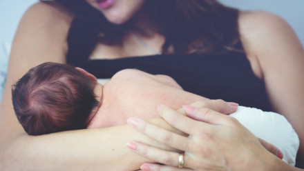 New mom breastfeeding her baby