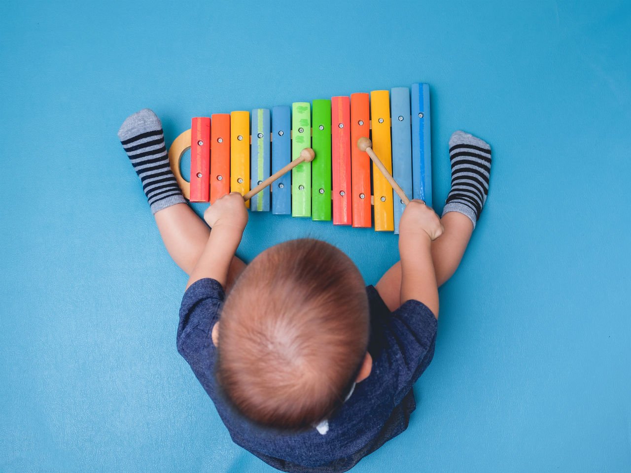 baby playing xylophone