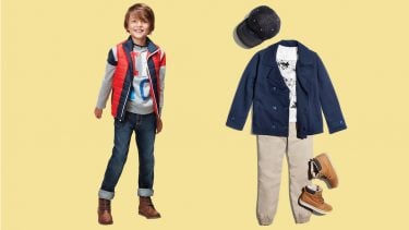 boy with capsule wardrobe on and off figure shot of wardrobe beside him