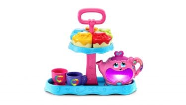 LeapFrog Musical Rainbow Tea Party set, including a plastic teapot, two teacups and slices of cake on a stand