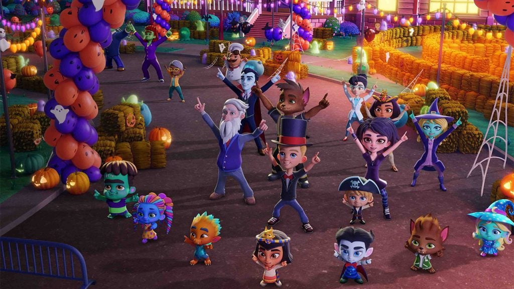 Promo image for Super Monsters Save Halloween showing monsters dancing at a halloween party
