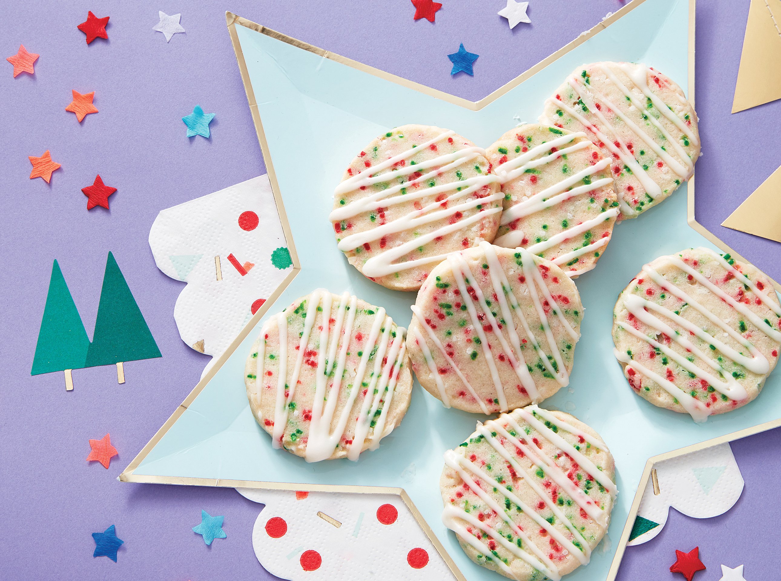 star-shaped plate filled with holiday cookies