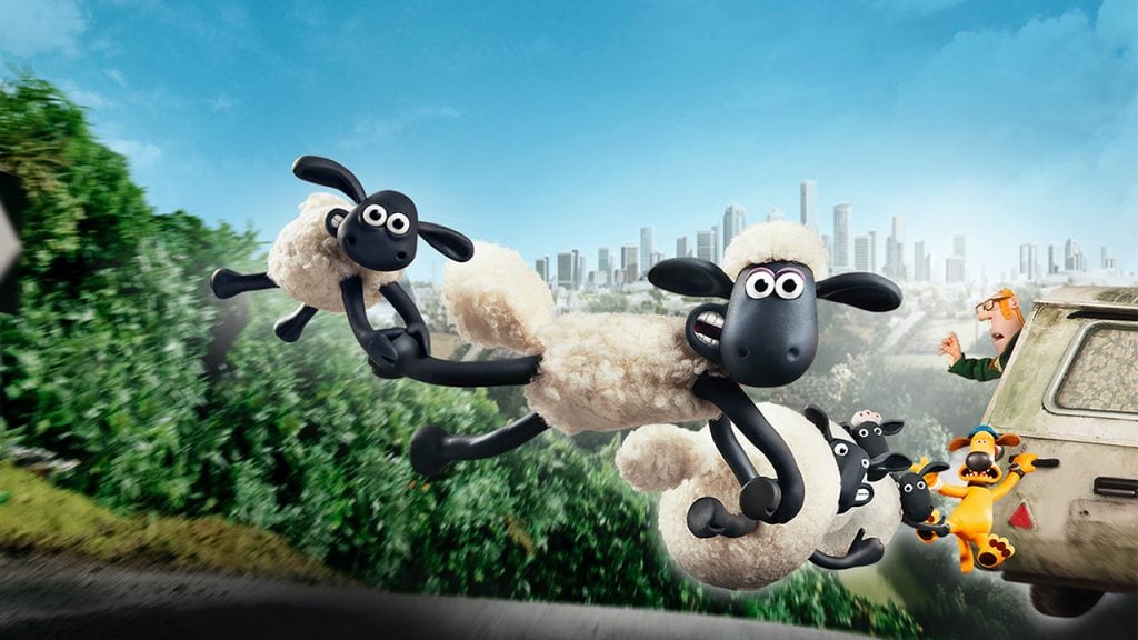 Promo image for Shaun the Sheep Movie showing the sheep holding on in a chain as they're being pulled behind a car