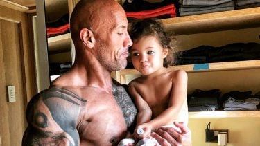 The Rock carrying his daughter Jasmine