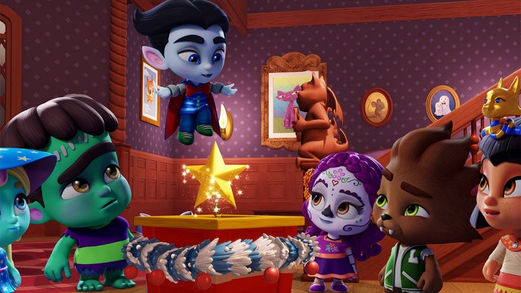 Promo Image for Super Monsters and the Wish Star showing kid monsters standing around a glittery star