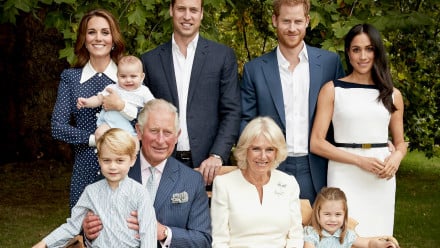 A picture of the royal family sitting in the gardens of Clarence House
