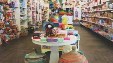 tables and shelves covered in colourful toys