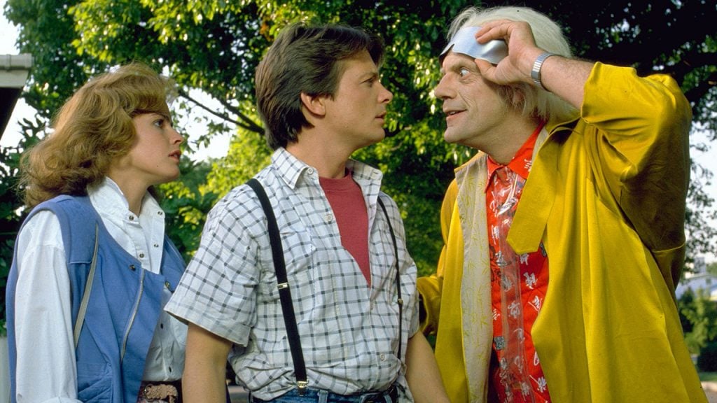 Promo for Back to the Future Part 2 showing an old man talking to a young couple
