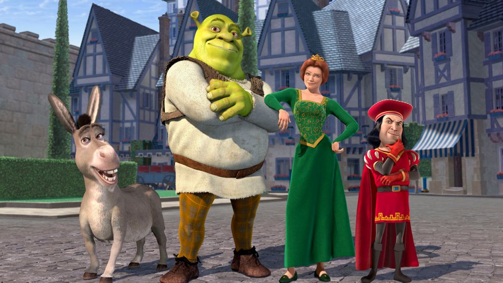 Promo image for Shrek showing the main characters standing in a village square