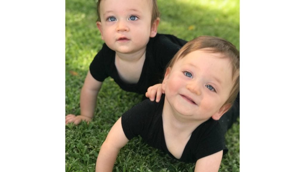 twin boys in grass