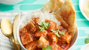 bowl of yummy butter chicken with rice