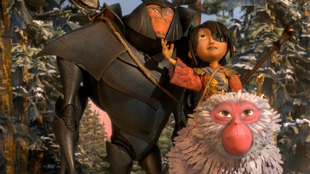 Promo image for Kubo and the Two strings showing a animated boy travelling with a warrior and a monkey