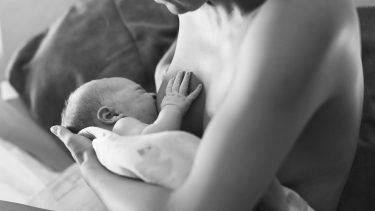 Mother breastfeeding after trying fenugreek and blessed thistle