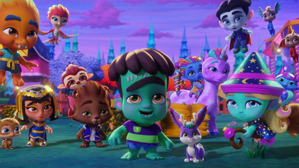Promo image for Super Monsters Furever Friends showing a group of monster kids in a field with their pets.