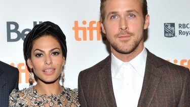 eva mendes wearing a black turban with ryan gosling on the red carpet at TIFF