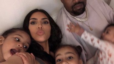 Kanye West and Kim Kardashian take a selfie with their kids