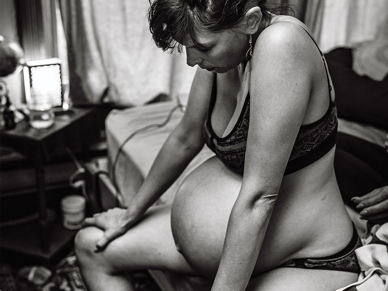 pregnant woman about to give birth at home