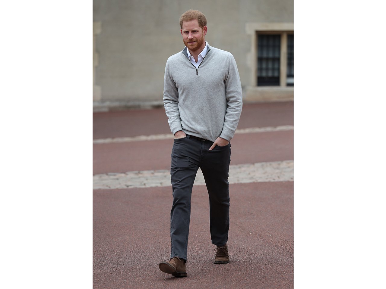 Prince Harry walking out of Windsor Castle to announce the birth of his son